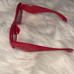 Red sunglasses (brand new) comes with a case.